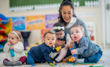 babies playing in classroom