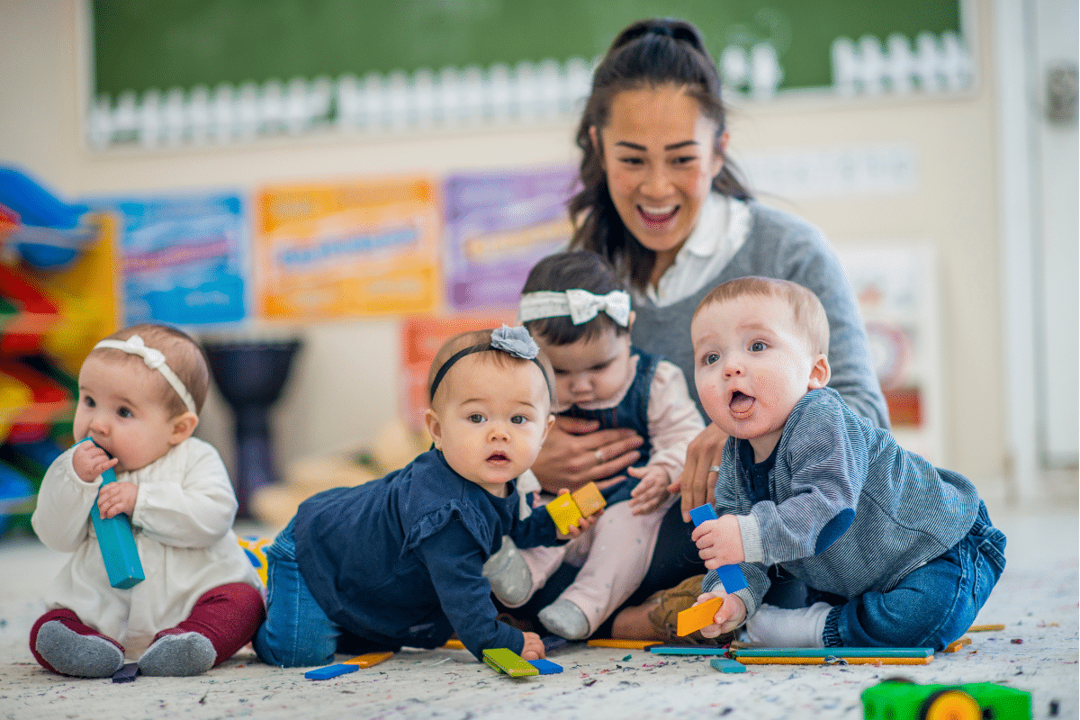 babies playing in classroom