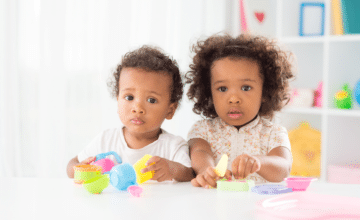 two children with toys