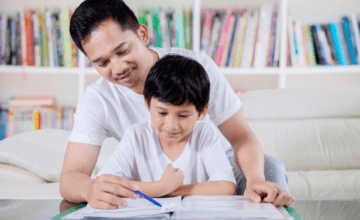 father helps son study