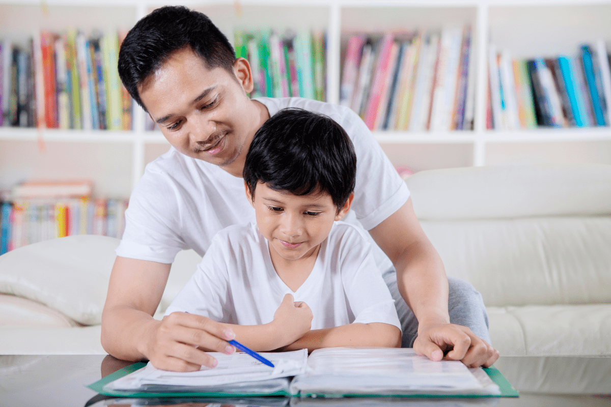 father helps son study