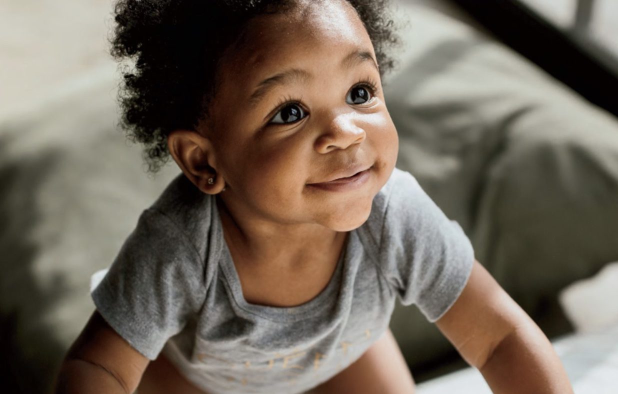 a baby learning to crawl