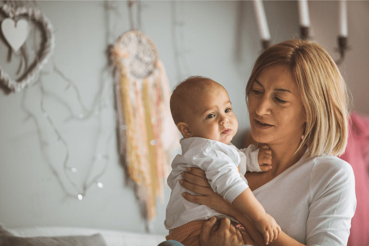 concerned mom holding baby