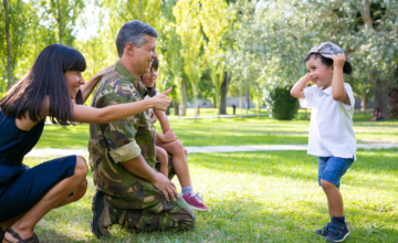 military dad with family at park