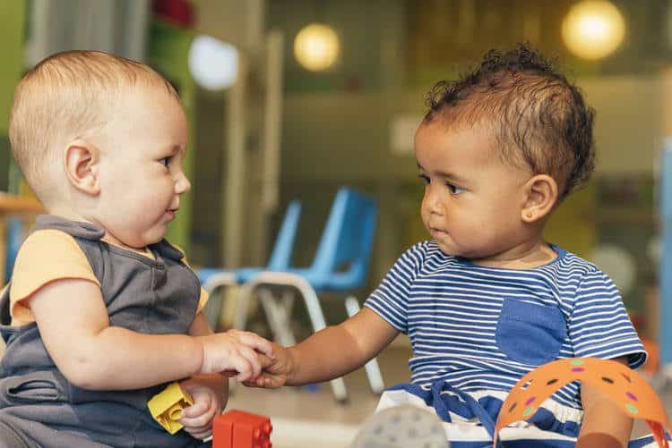 Two babies interacting