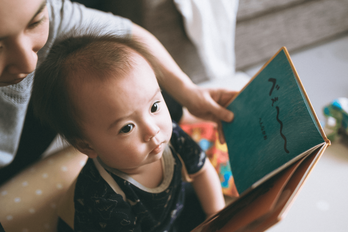 showing a boy a book