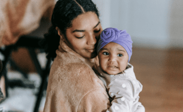 mom hugs concerned baby