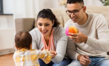 Parents playing with toddler