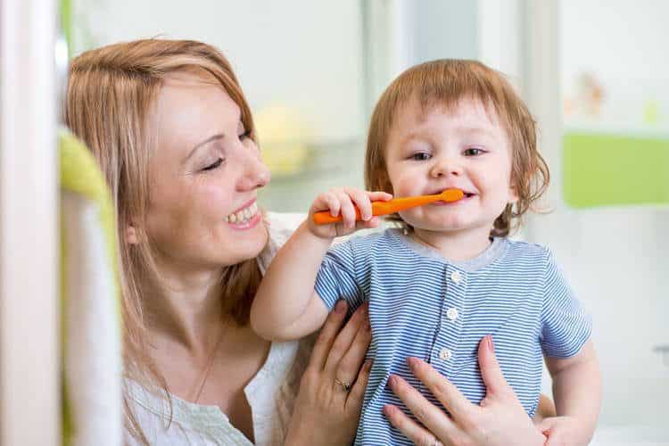 Baby brushing teeth