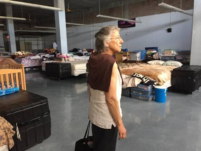 Author Grace Whitney touring a family shelter in Honolulu, Hawaii