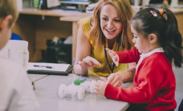 Child care teacher in classroom