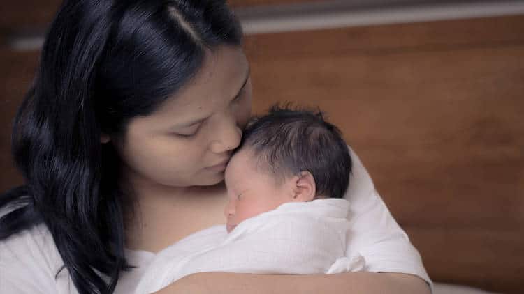 Mother holding baby