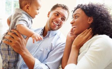 Parents holding child