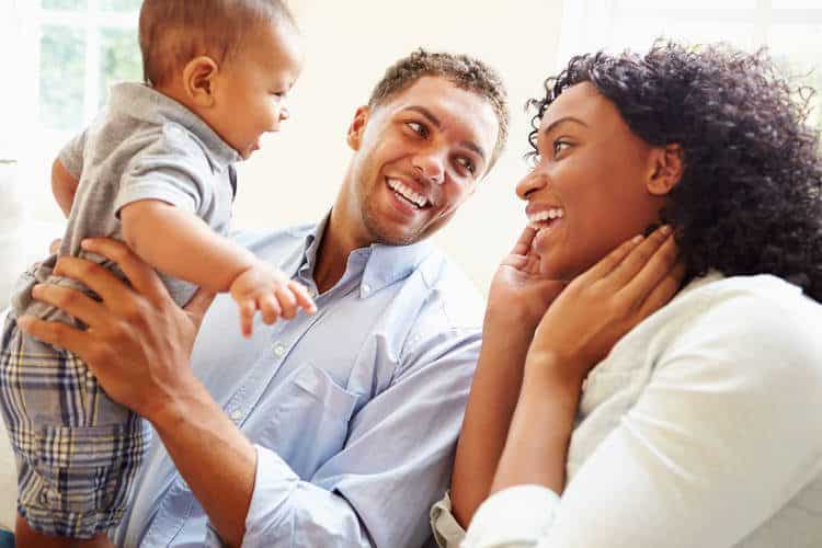 Parents holding child