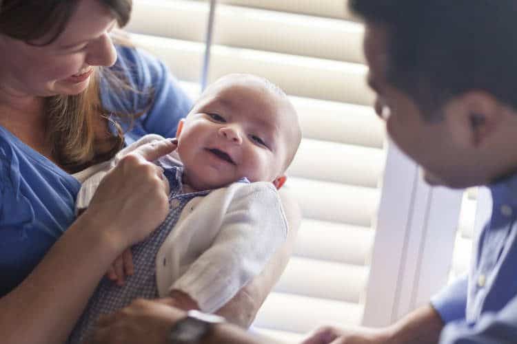 Baby being held