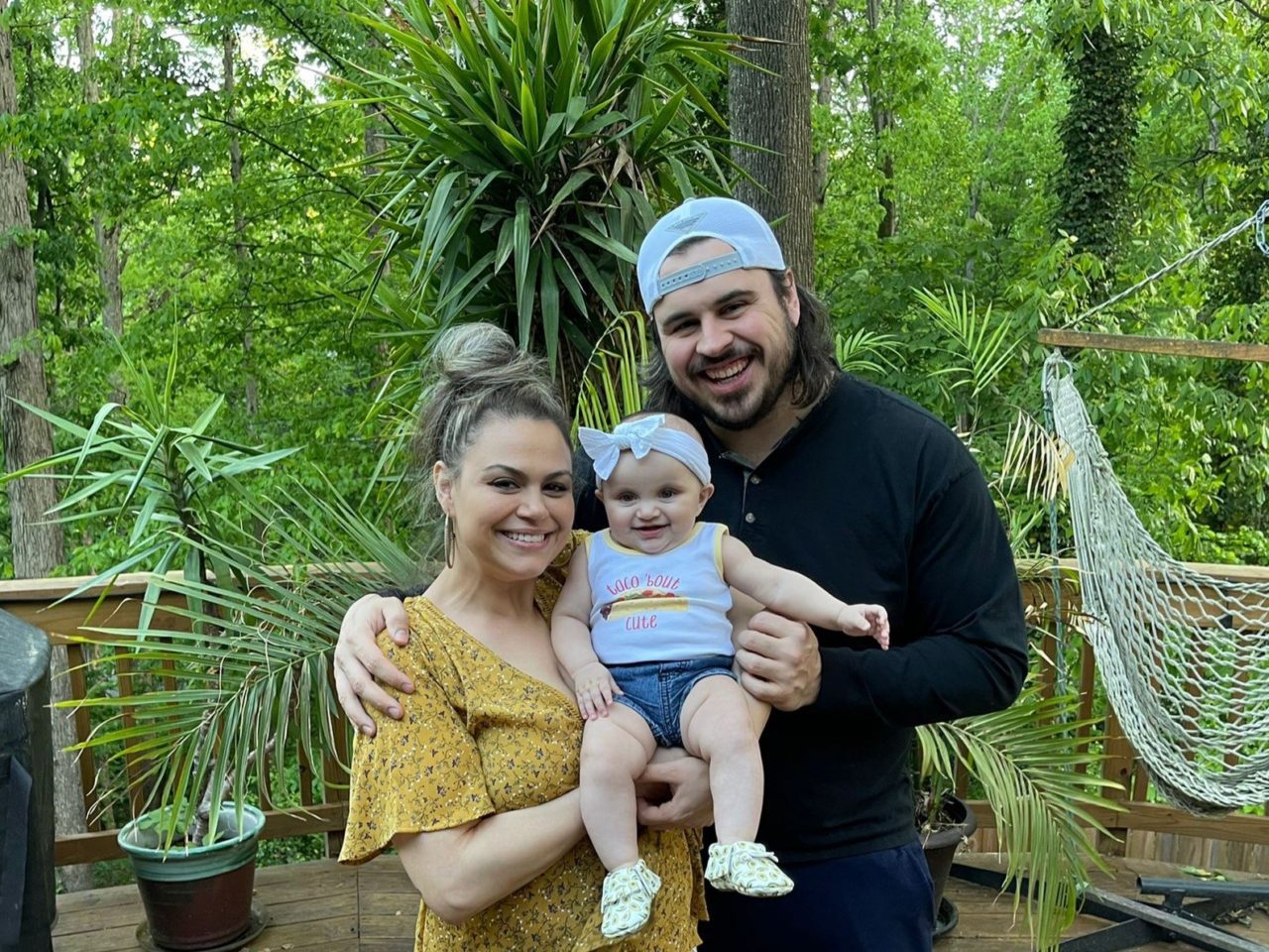 Melissa Flores, Program Coordinator, HealthySteps, with husband and daughter