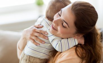 mother hugging baby