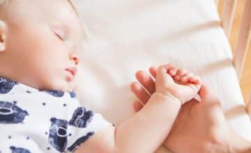 Infant Sleeping in Crib