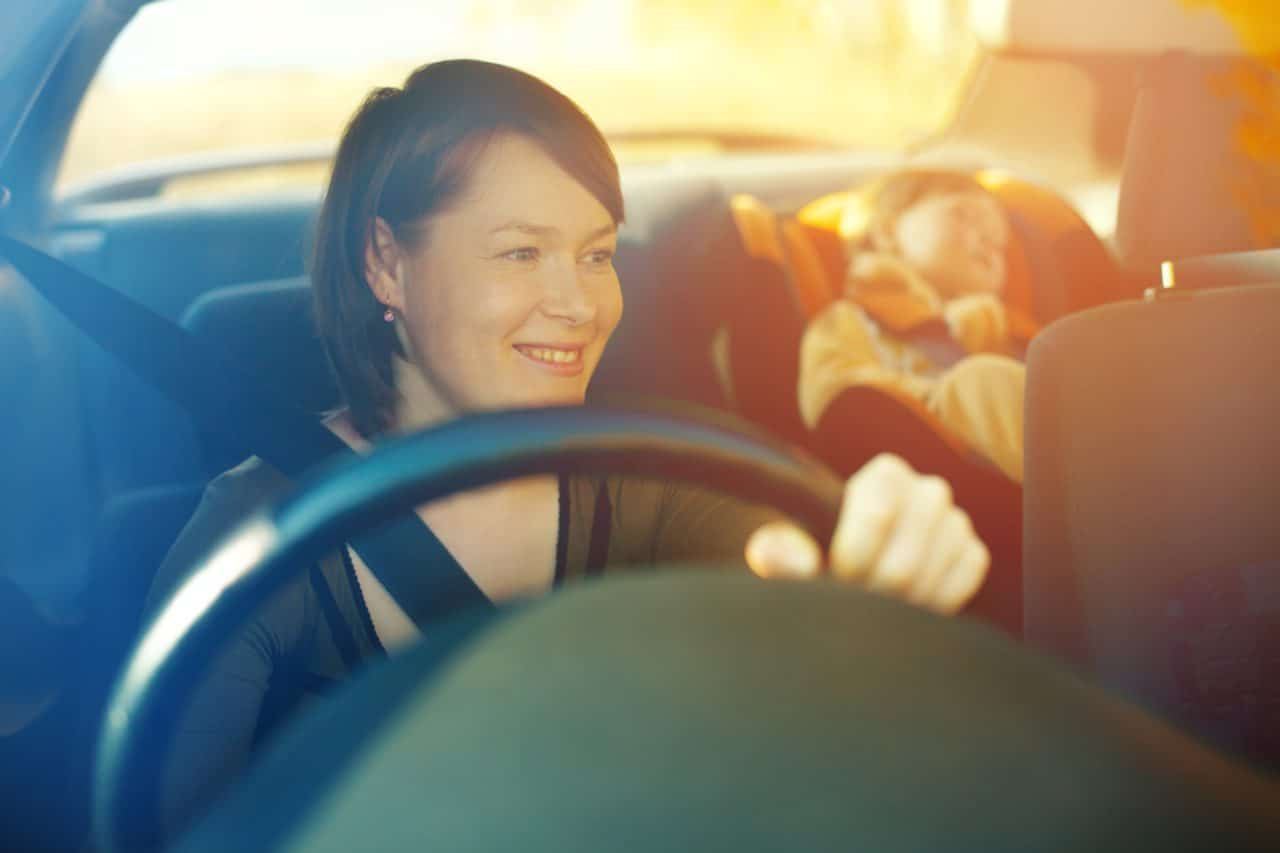 woman driving in car