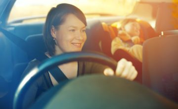 woman driving in car