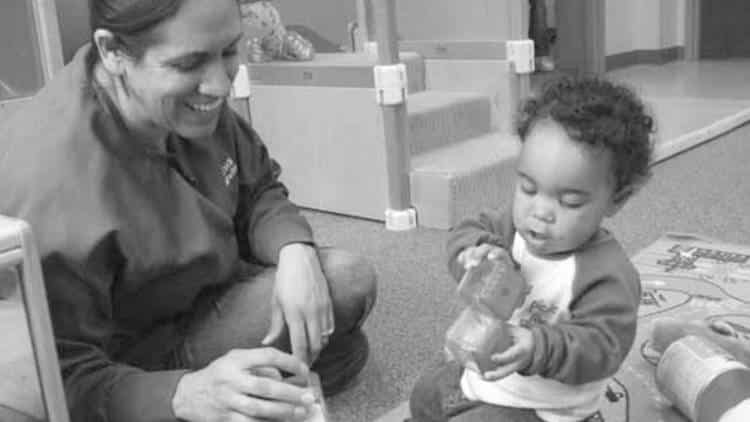 Adult with a young toddler