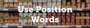 The words "Use Position Words" over cans of soup