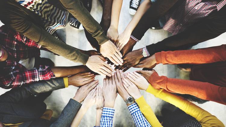 Group of hands in a circle