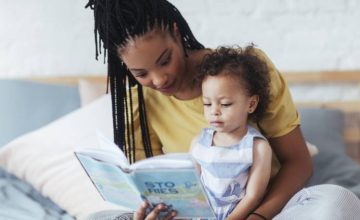 mom reading to toddler