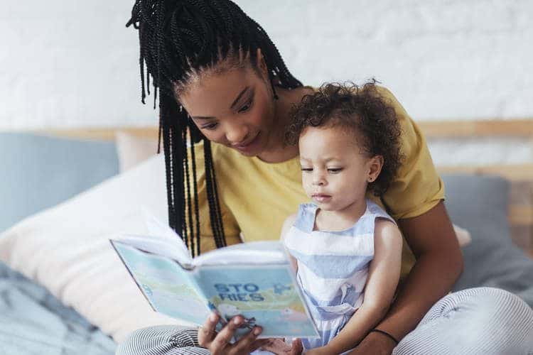 mom reading to toddler