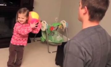 daughter throwing toys at father