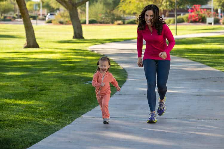 mom chasing after baby