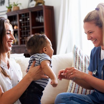 Home Visiting Nurse with infant and family