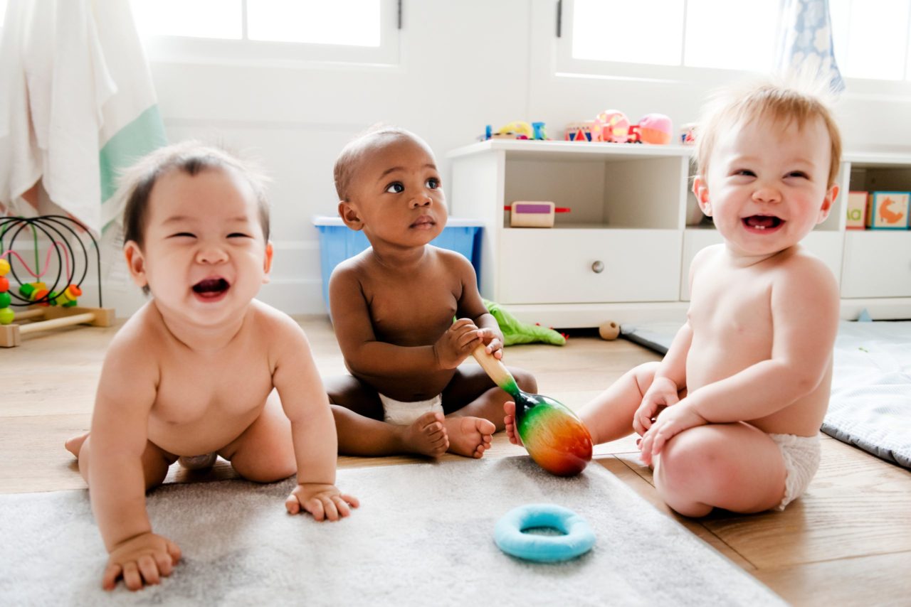 three babies playing at daycare