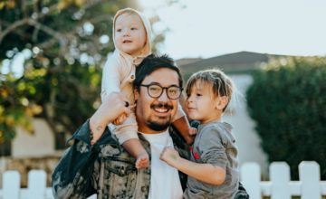 Father with toddler and baby