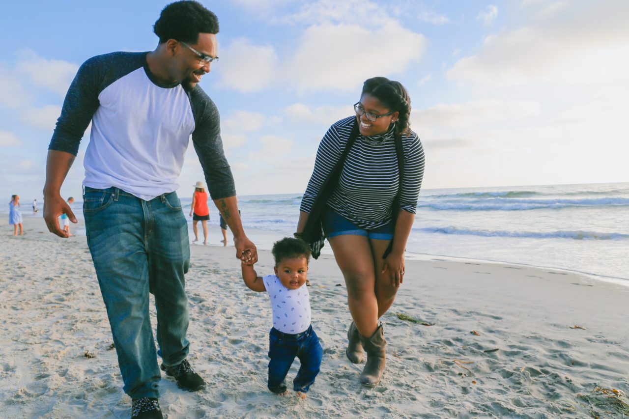 black family on beach