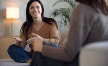 Psychologist session. A middle aged woman in therapy with an woman psychologist.