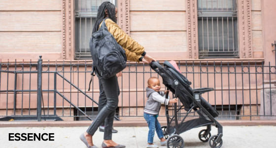 Essence Magazine, woman pushing stroller with toddler