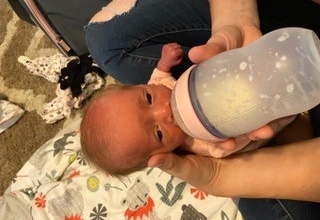 Baby Carlie Drinking from a Bottle