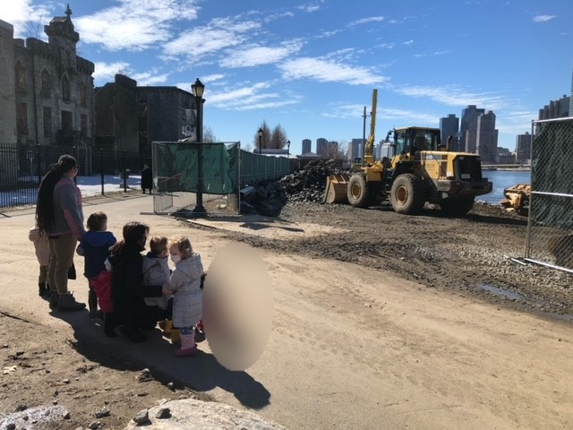 Preschool students and teachers visiting construction site.
