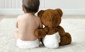 Baby with a teddy bear