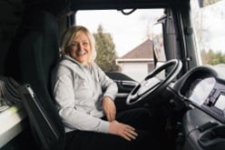 Photo of a female bus driver smiling