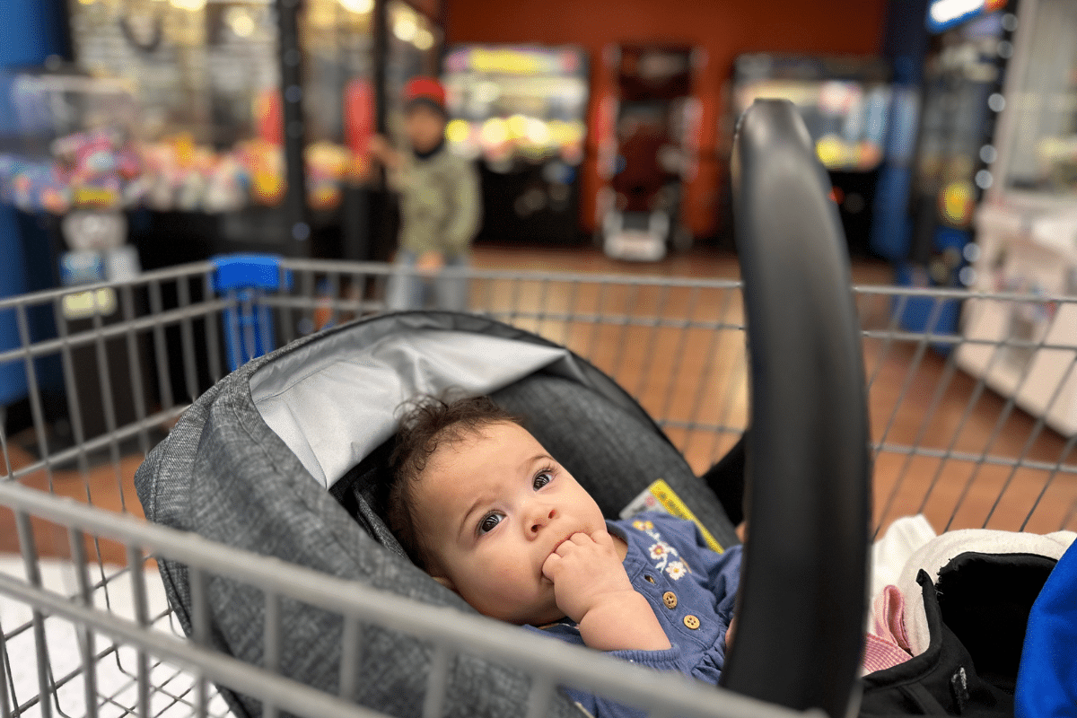 baby in shopping cart