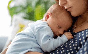 infant on mother's chest