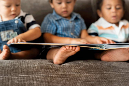 toddlers reading books together antiracist parenting