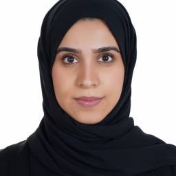 a woman wearing a black headscarf