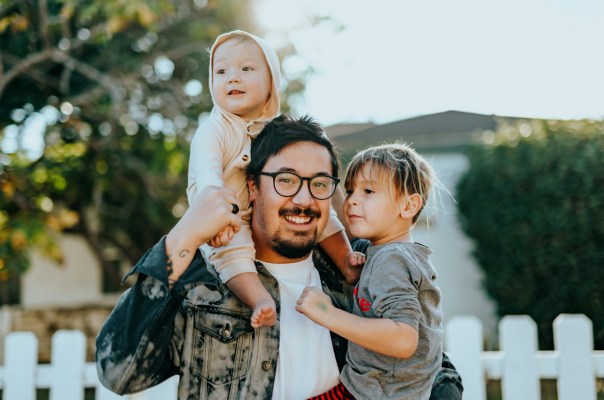 Father with toddler and baby