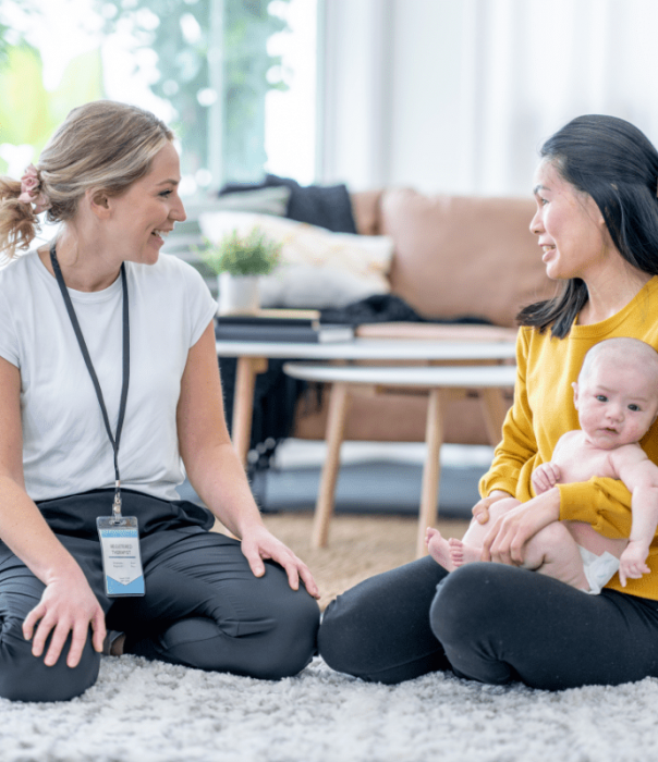 An infant mental health specialist meeting with a parent and infant.